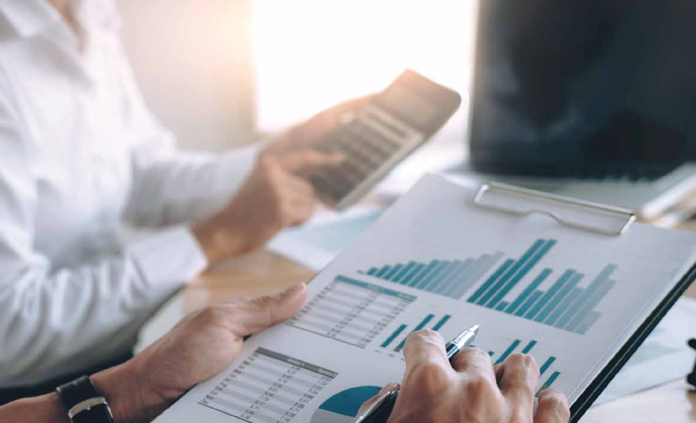 National Finance specialists reviewing financial analysis